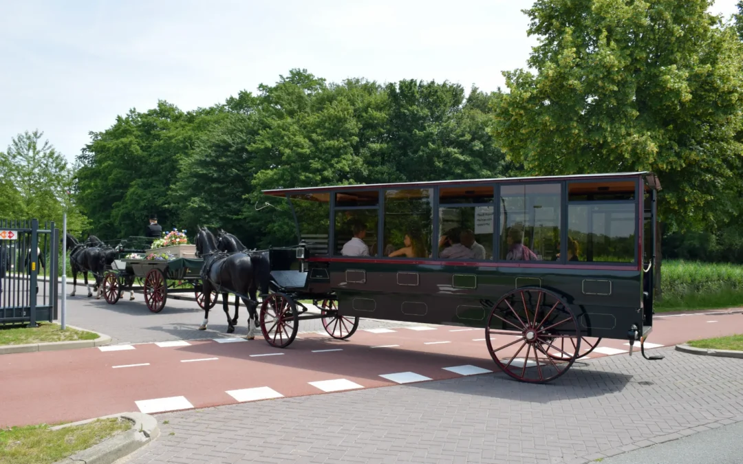 Paardenkoets familie rouwvervoer